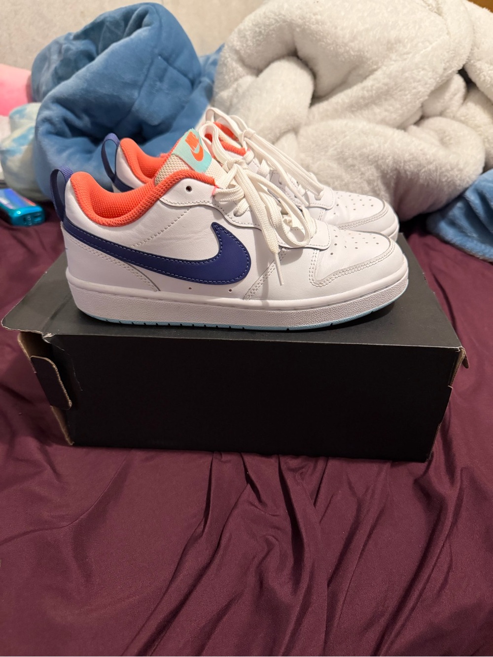 Nike Kids White Sneakers with Blue Swoosh and Coral Interior